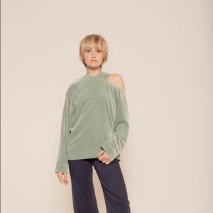 Asymmetrical cut out top in lush velvet